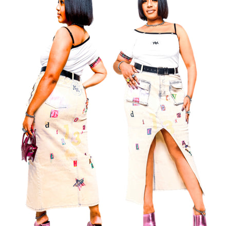 Express your style and faith with our Love Skirt. Mineral washed denim with a split leg, adorned with a 1 Corinthians 13:4 design.